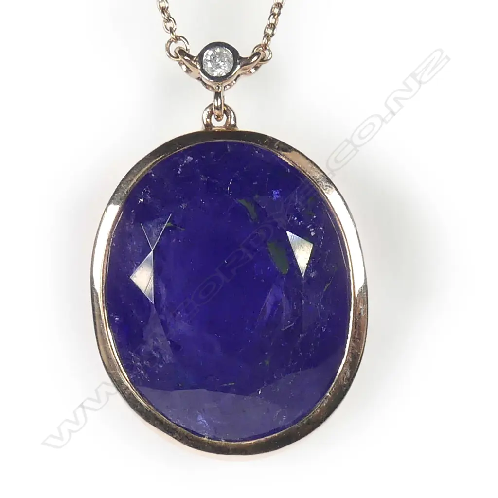 A 14ct rose gold tanzanite and diamond pendant Image 1++