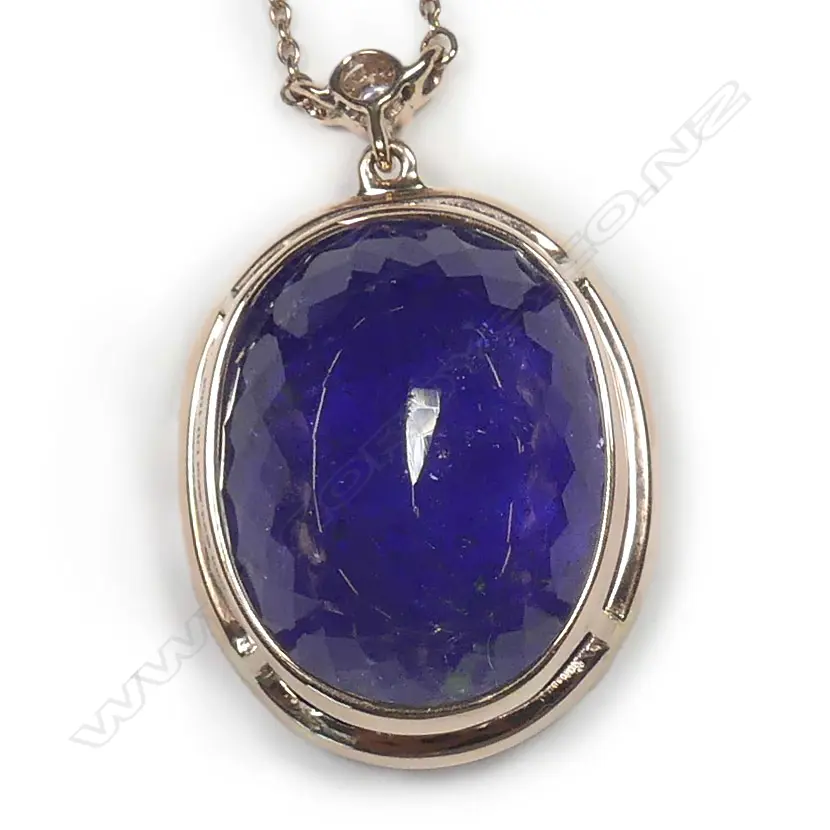 A 14ct rose gold tanzanite and diamond pendant Image 1++