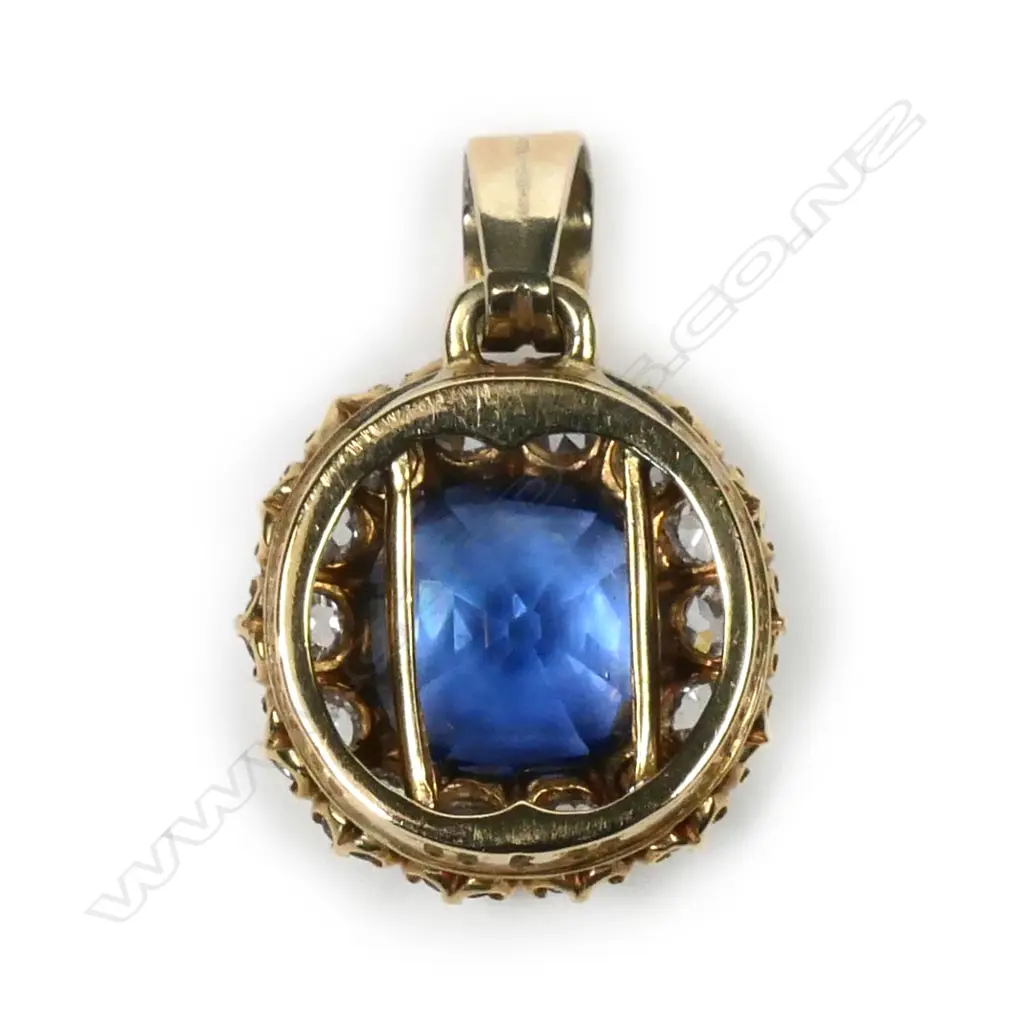 An 17ct gold sapphire and diamond pendant Image 1++