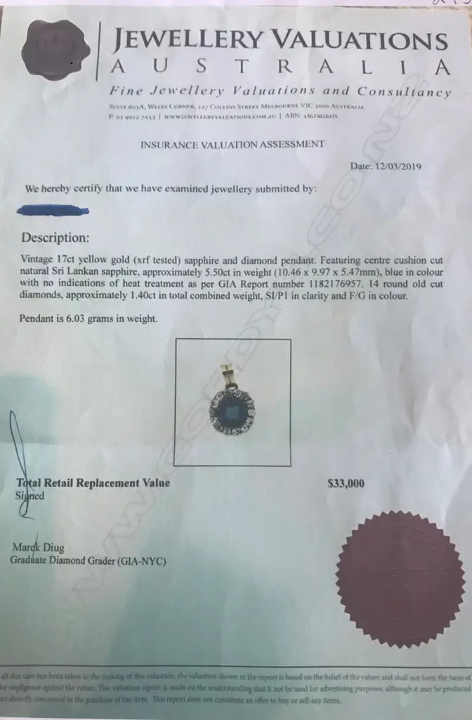 An 17ct gold sapphire and diamond pendant Image 1++