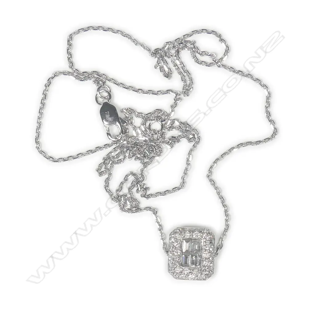 A 9ct white gold and diamond pendant on chain Image 1++