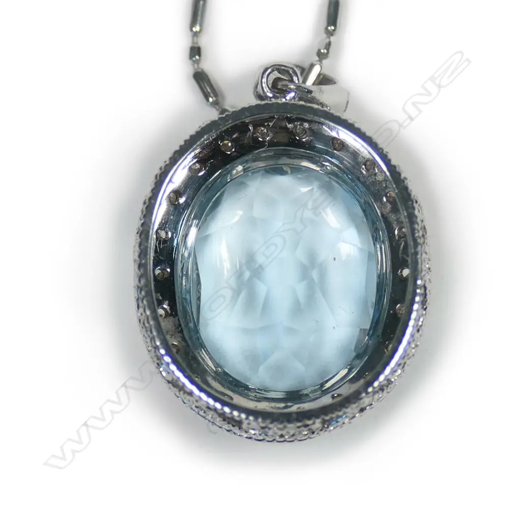 A 14ct white gold aquamarine and diamond pendant necklace Image 1++