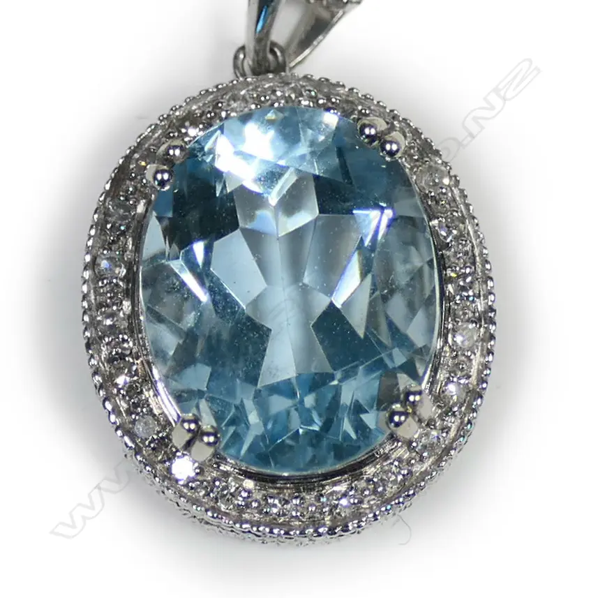A 14ct white gold aquamarine and diamond pendant necklace Image 1++