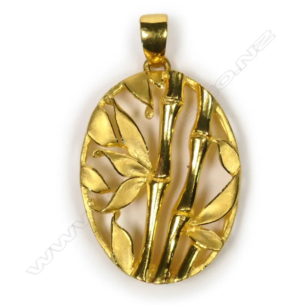 A Chinese 22ct gold pendant Image 1++