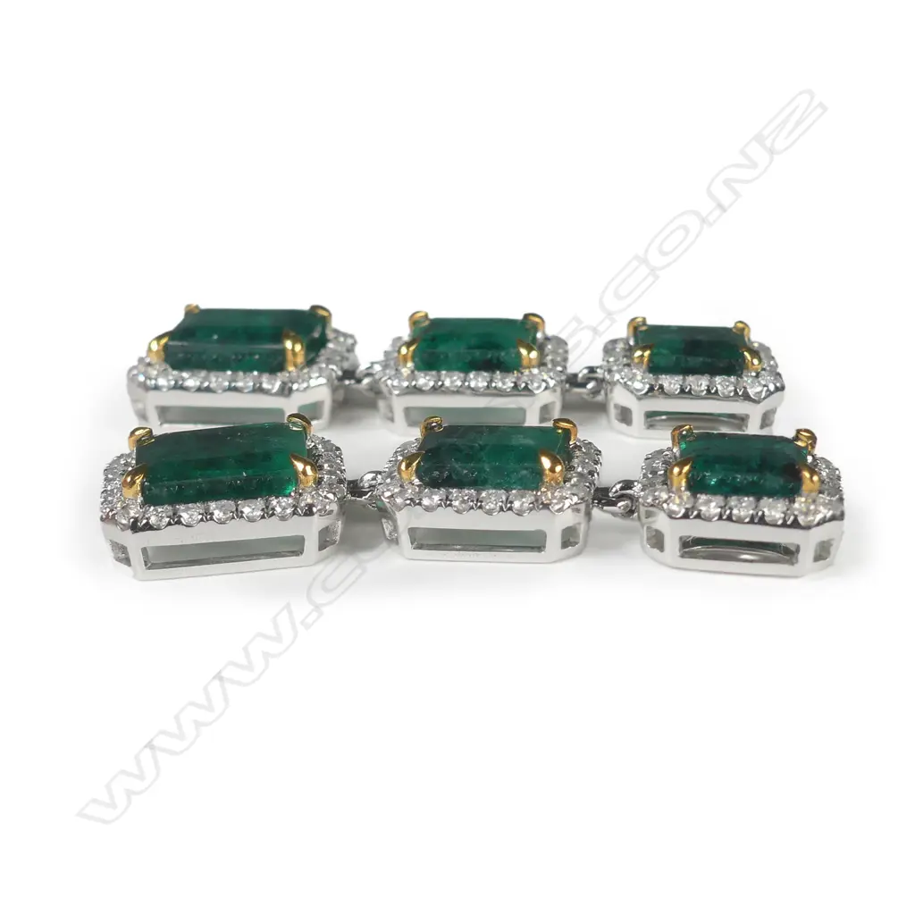 A pair of platinum emerald and diamond drop earrings Image 1++