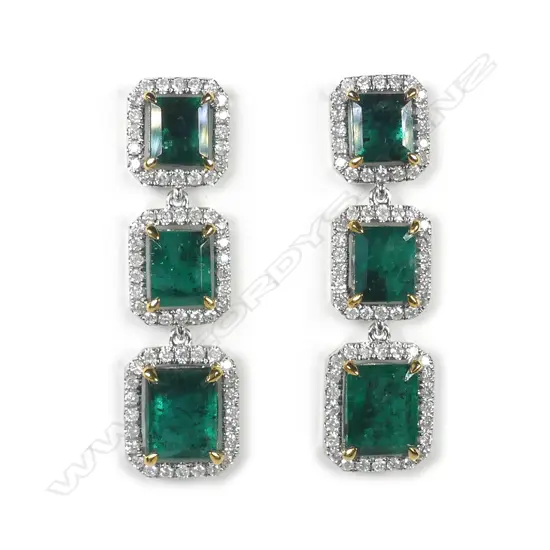 A pair of platinum emerald and diamond drop earrings