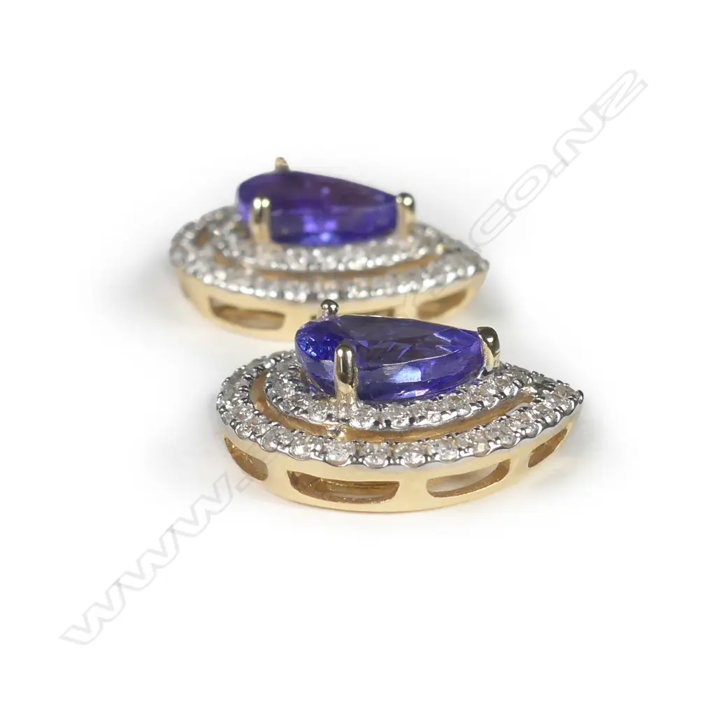 A 14ct yellow gold tanzanite and diamond double halo earrings Image 1++