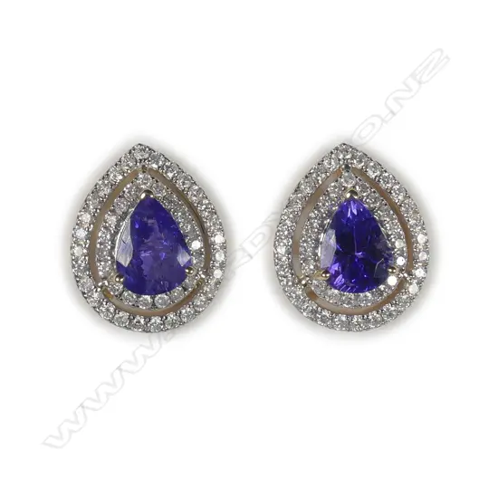 A 14ct yellow gold tanzanite and diamond double halo earrings