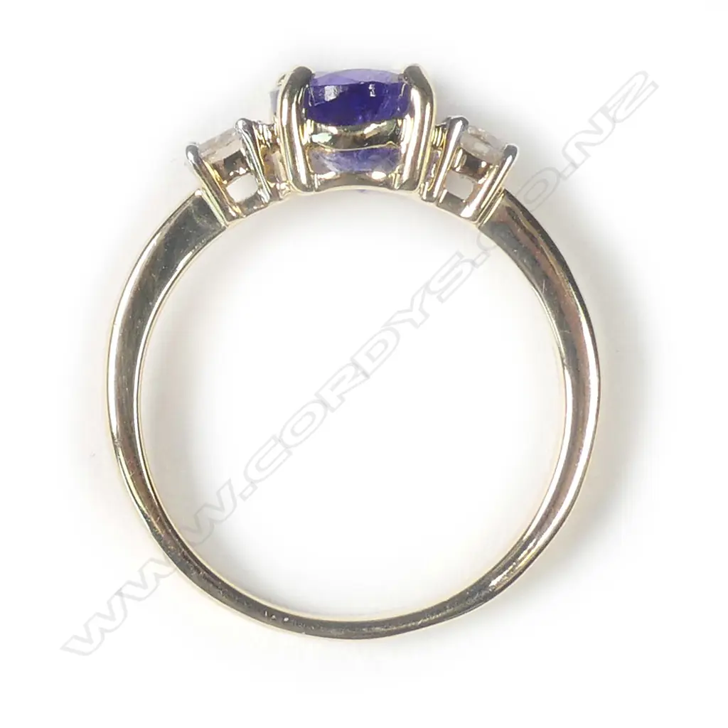 A 14ct yellow gold tanzanite and diamond ring Image 1++