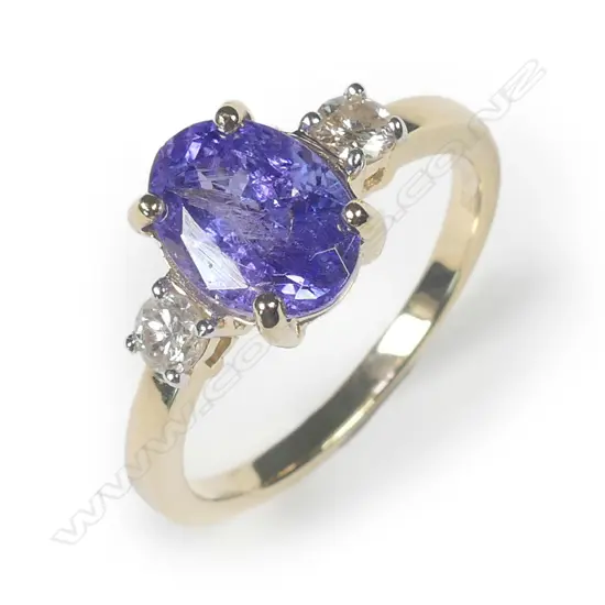 A 14ct yellow gold tanzanite and diamond ring