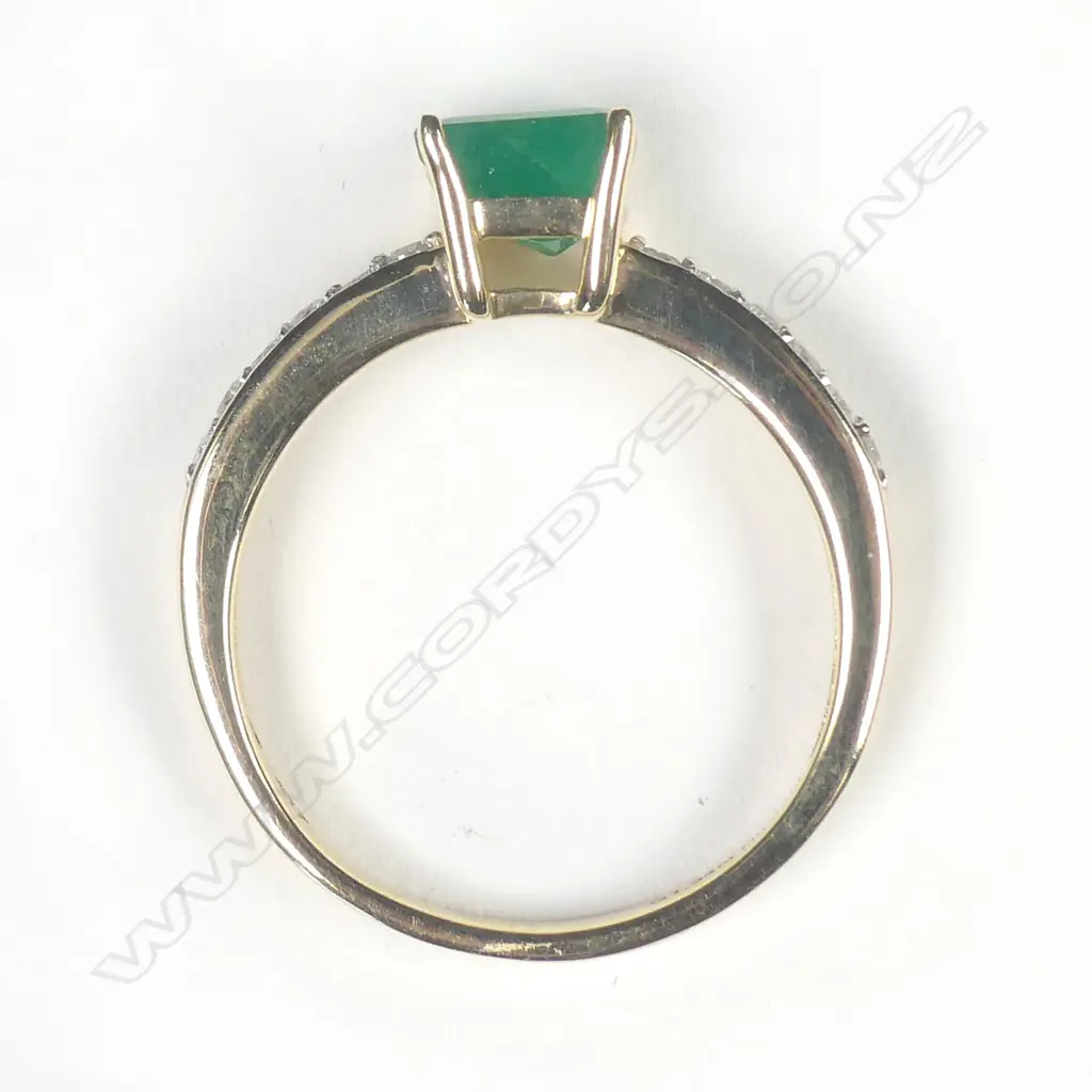 A 10ct gold emerald and diamond ring Image 1++