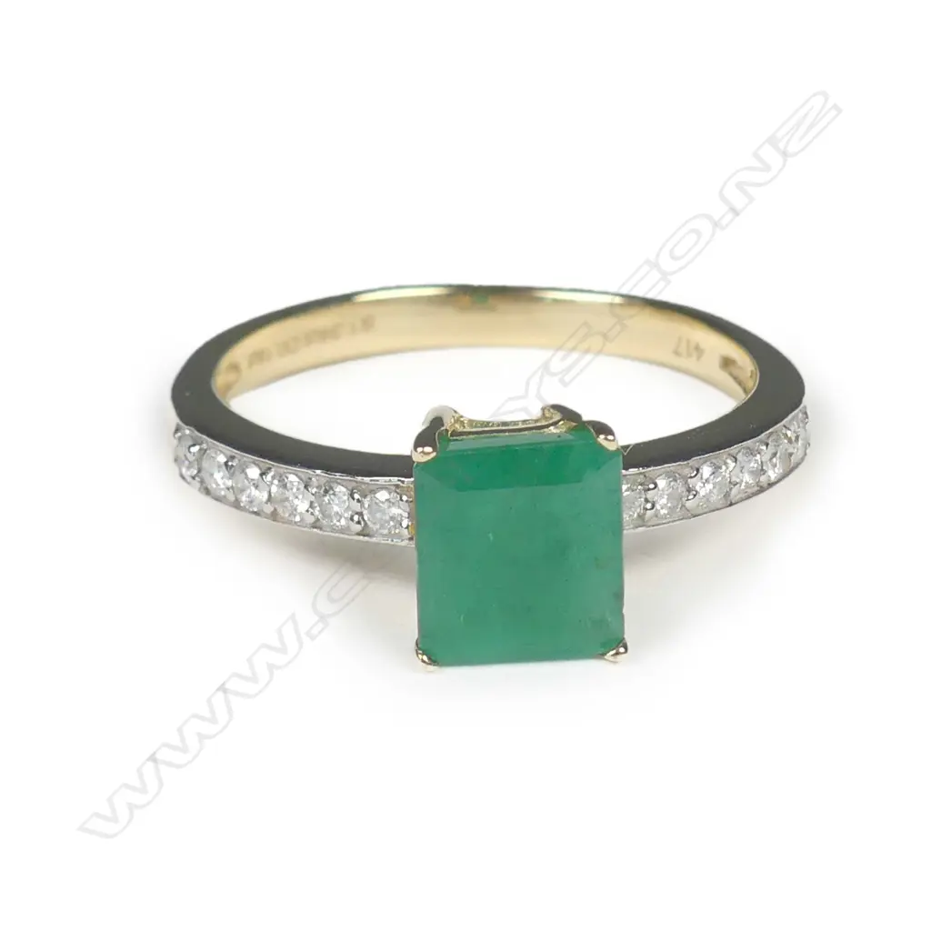 A 10ct gold emerald and diamond ring Image 1++