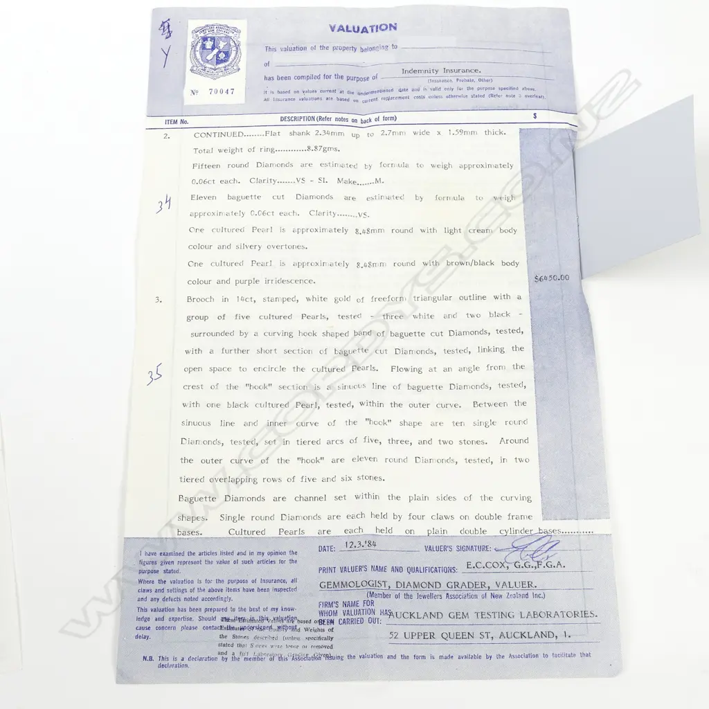 An impressive 14ct. white gold diamond and pearl ring and earrings suite Image 1++