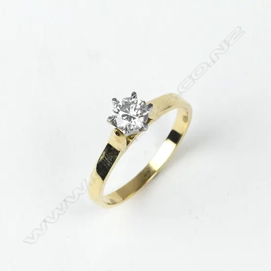 An 18ct gold solitaire diamond ring