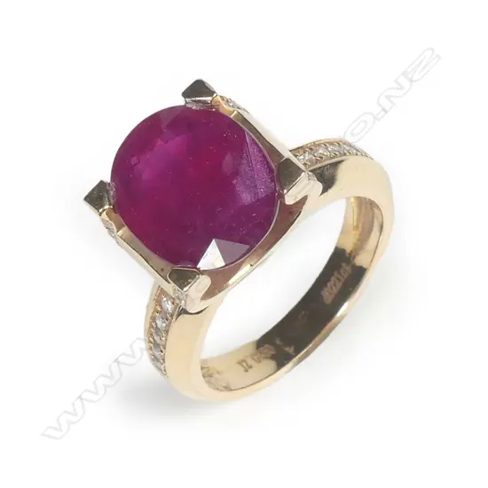 An 18ct rose gold ruby and diamond ring