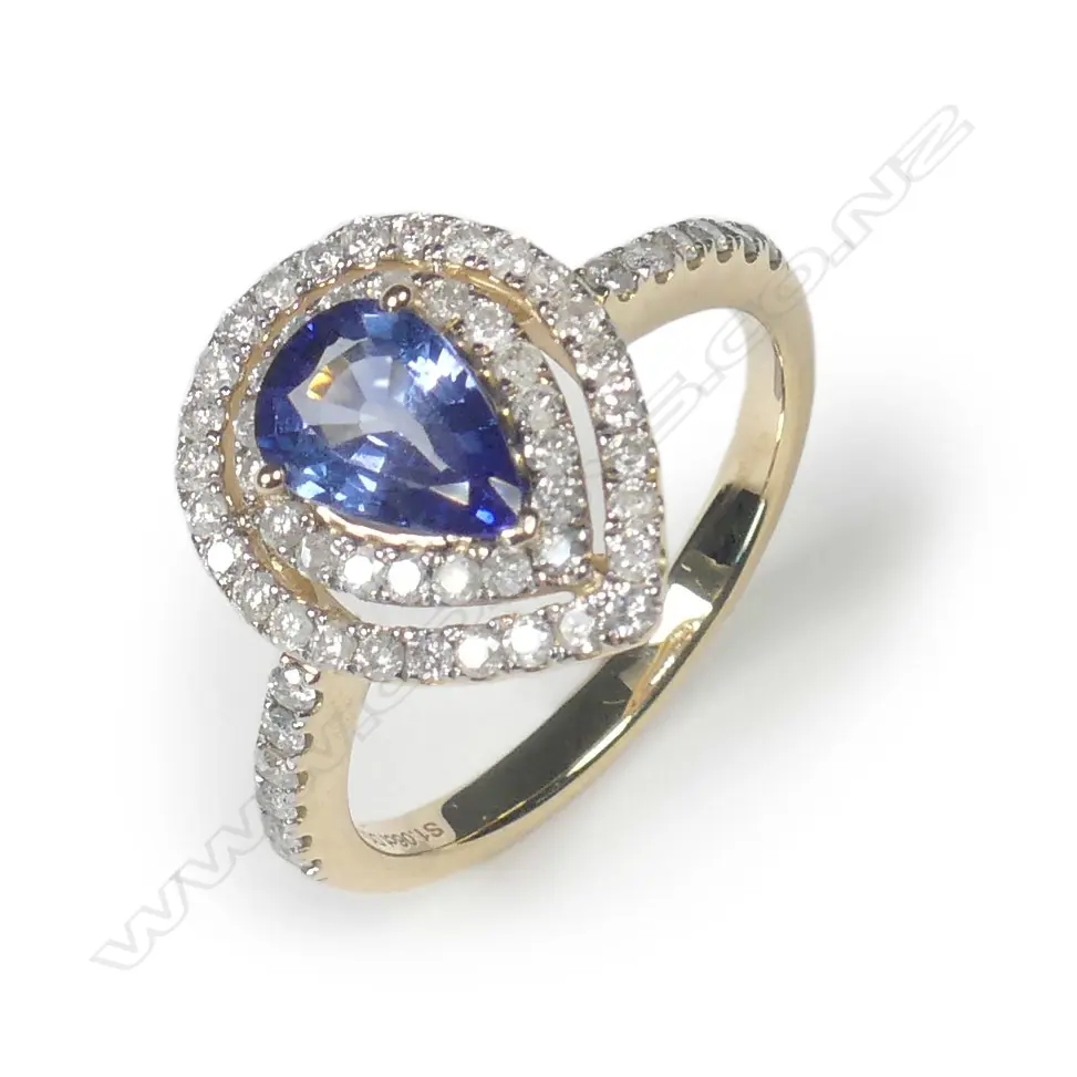A 14ct rose gold sapphire and diamond double halo ring Image 1++