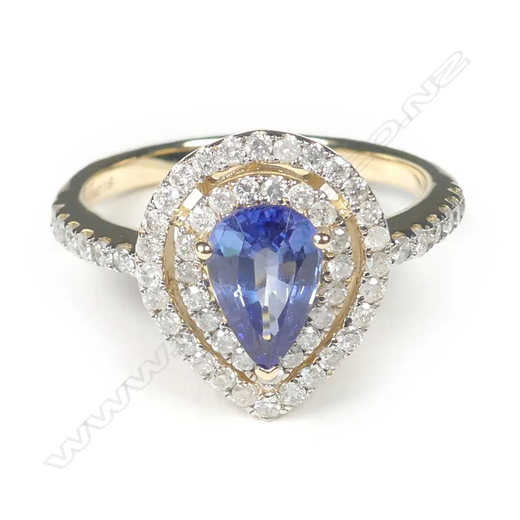 A 14ct rose gold sapphire and diamond double halo ring Image 1++