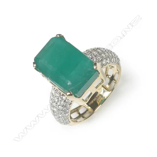 A 14ct yellow gold emerald and diamond dress ring