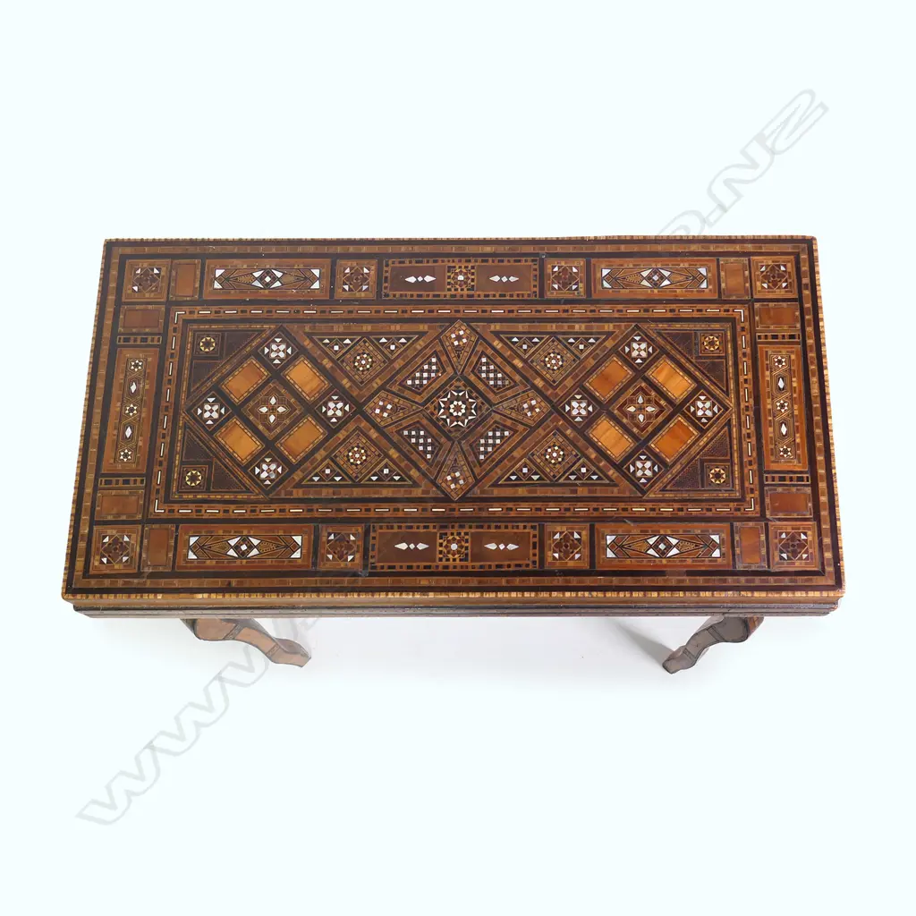 An early 20thC Syrian inlaid games table Image 1++