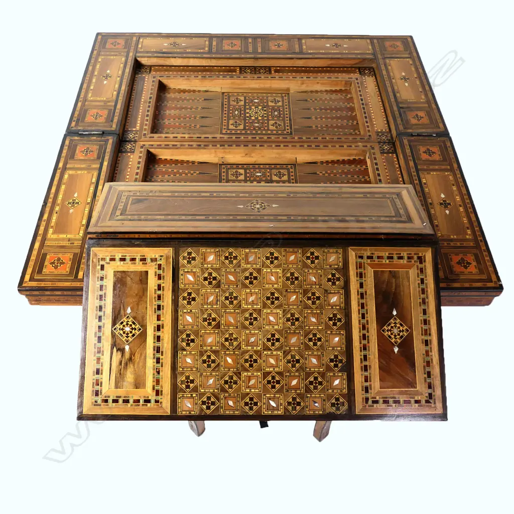 An early 20thC Syrian inlaid games table Image 1++