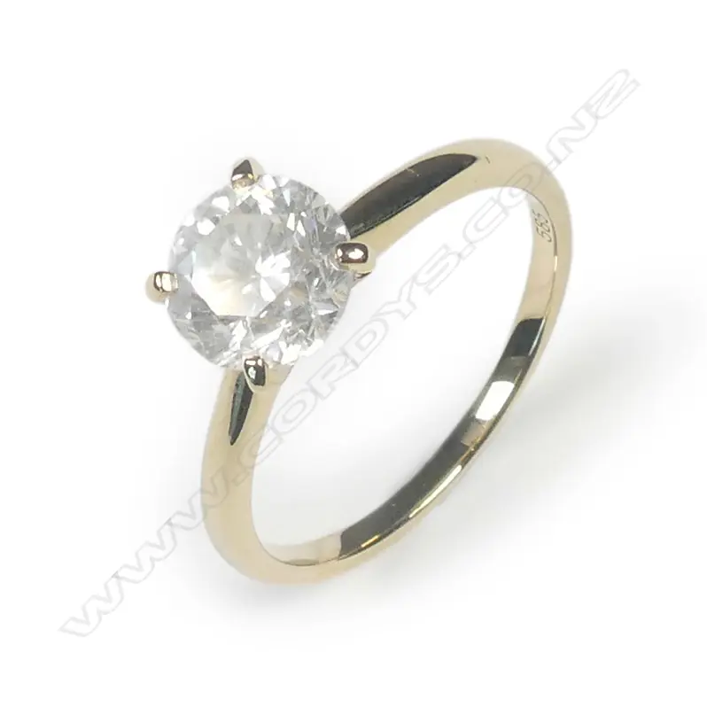 A 14ct yellow gold diamond solitaire ring Image 1++