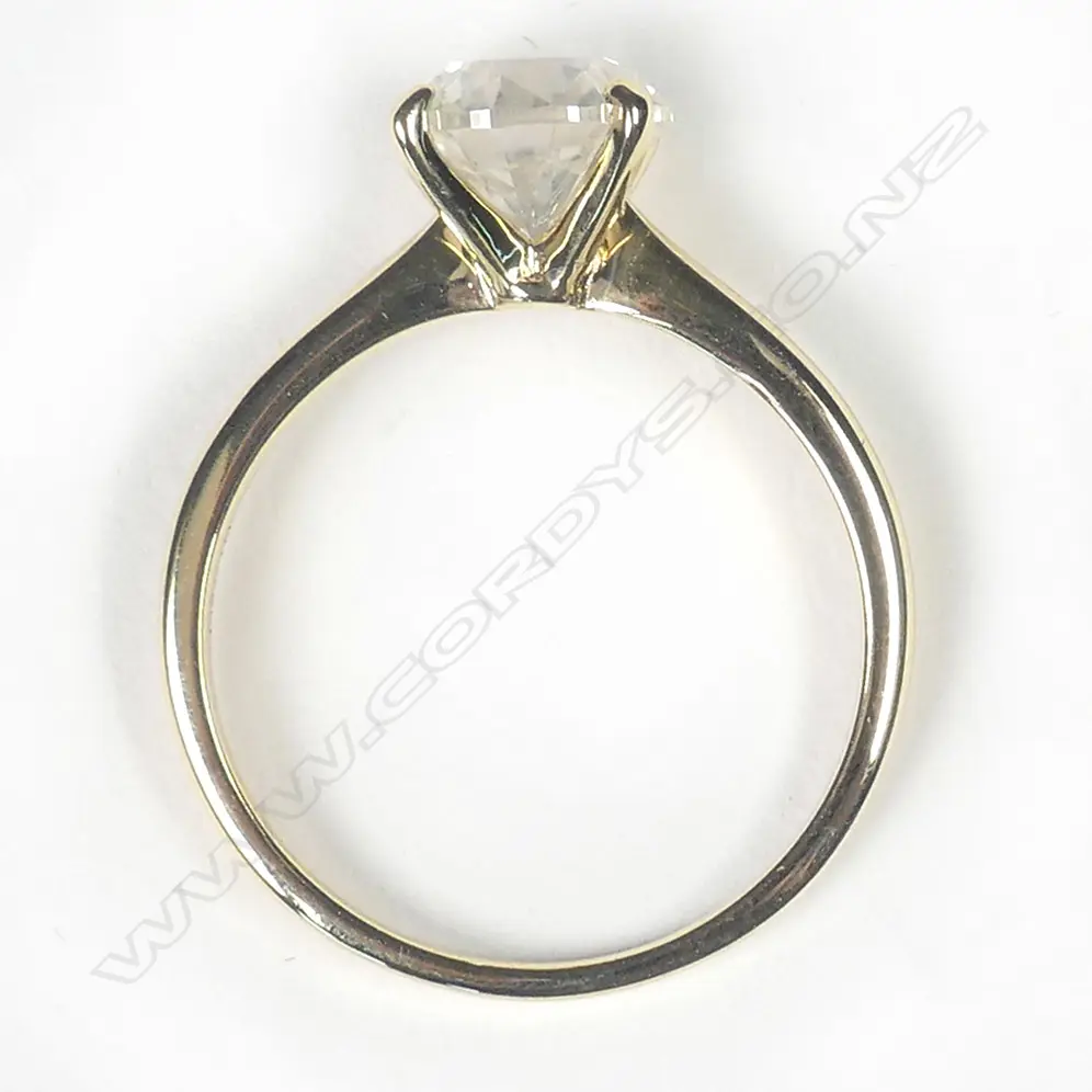 A 14ct yellow gold diamond solitaire ring Image 1++