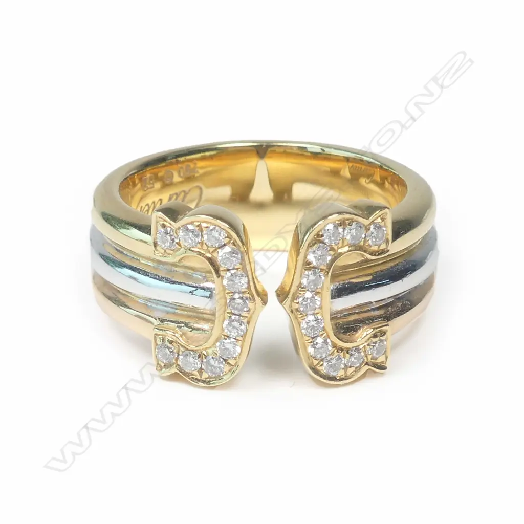 A Cartier 18ct yellow white and rose gold diamond ring Image 1++
