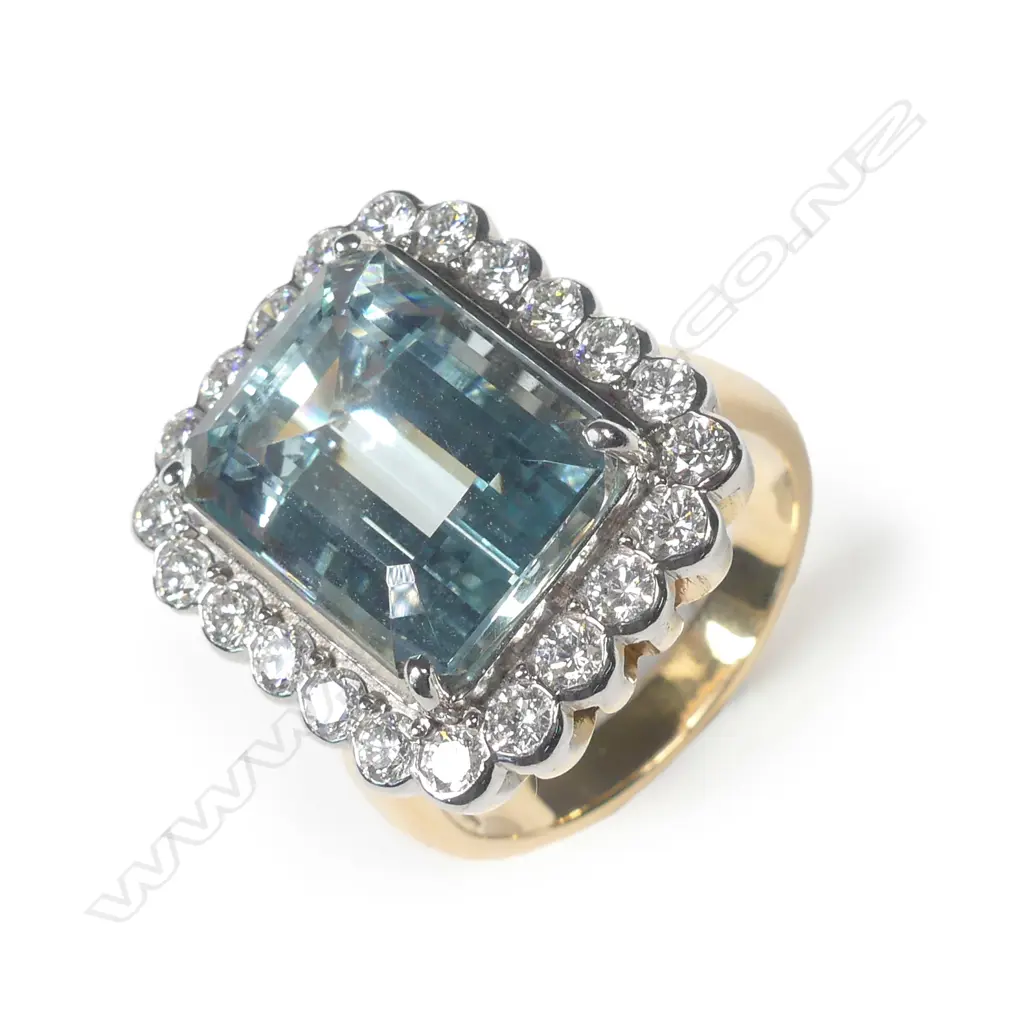 An 18ct pink gold aquamarine and diamond ring Image 1++