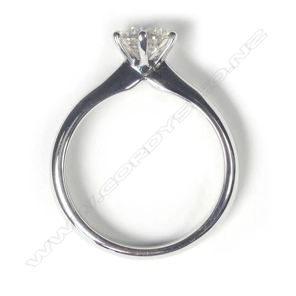 An 18ct white gold and diamond solitaire ring Image 1++