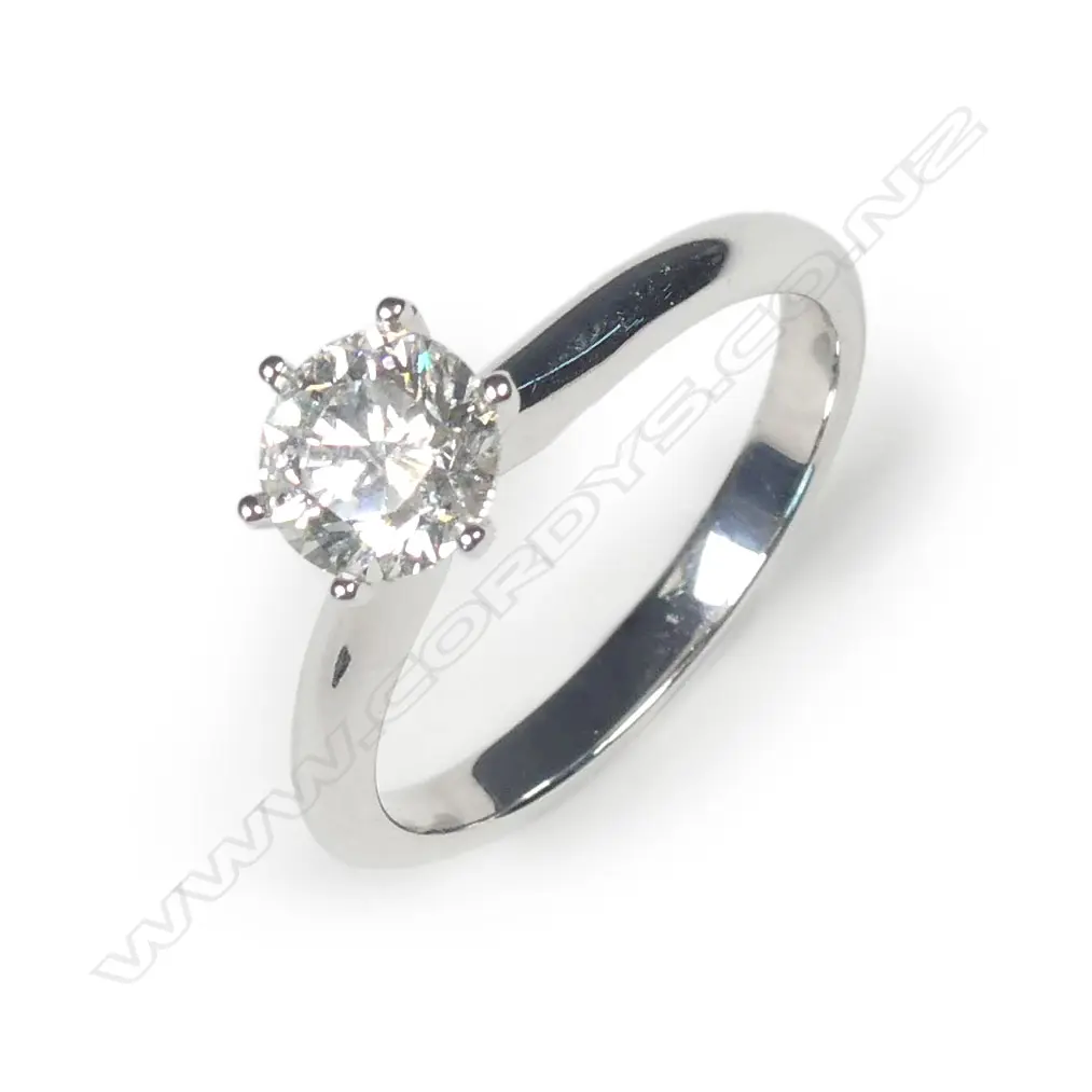 An 18ct white gold and diamond solitaire ring Image 1++