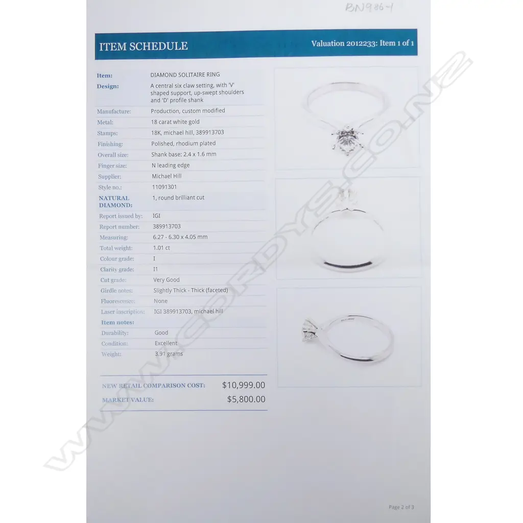 An 18ct white gold and diamond solitaire ring Image 1++