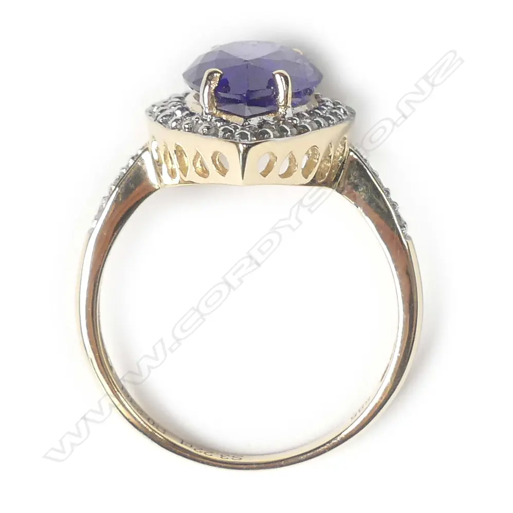 A 14ct gold tanzanite and diamond ring Image 1++