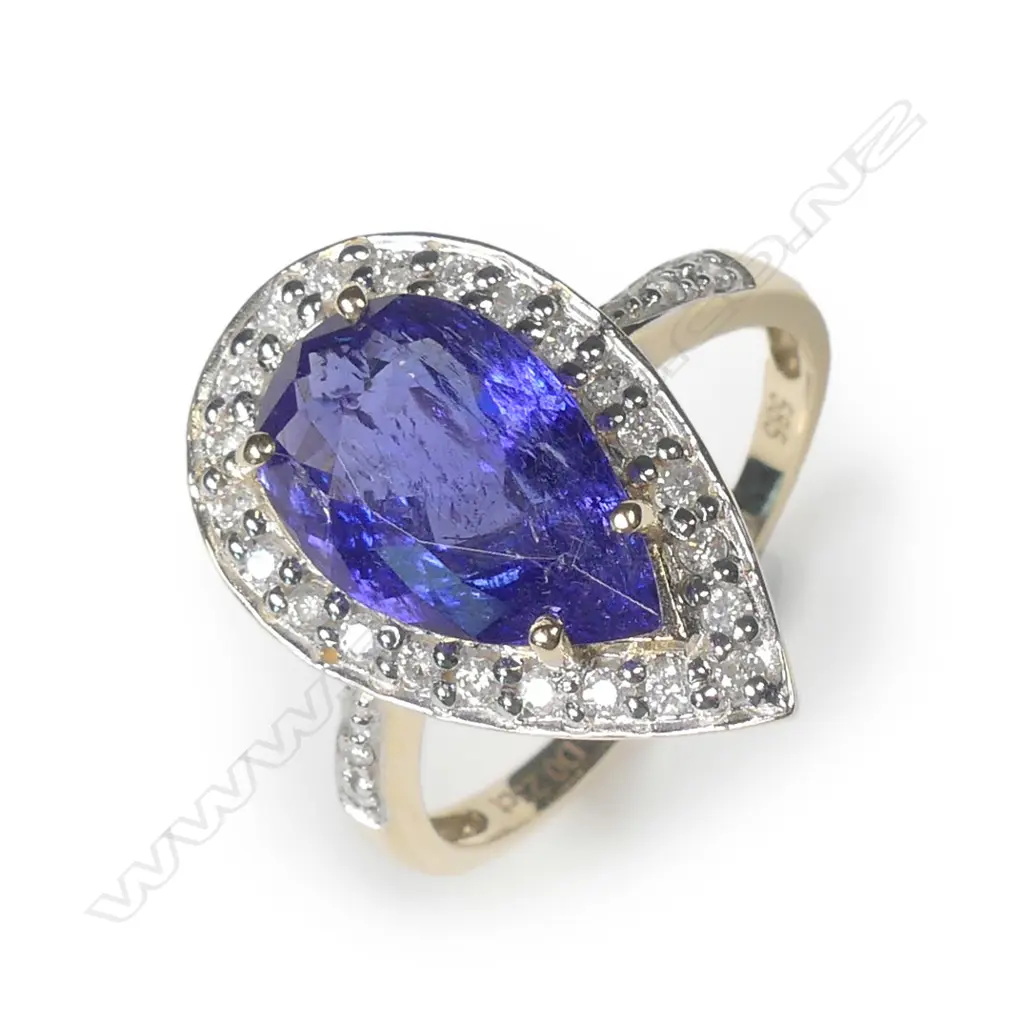 A 14ct gold tanzanite and diamond ring Image 1++