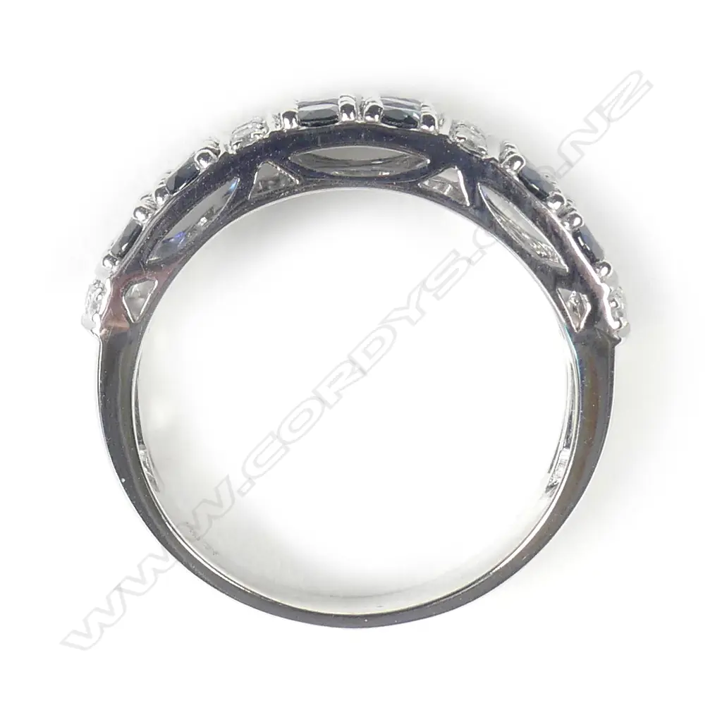 A 14ct white gold sapphire and diamond ring Image 1++