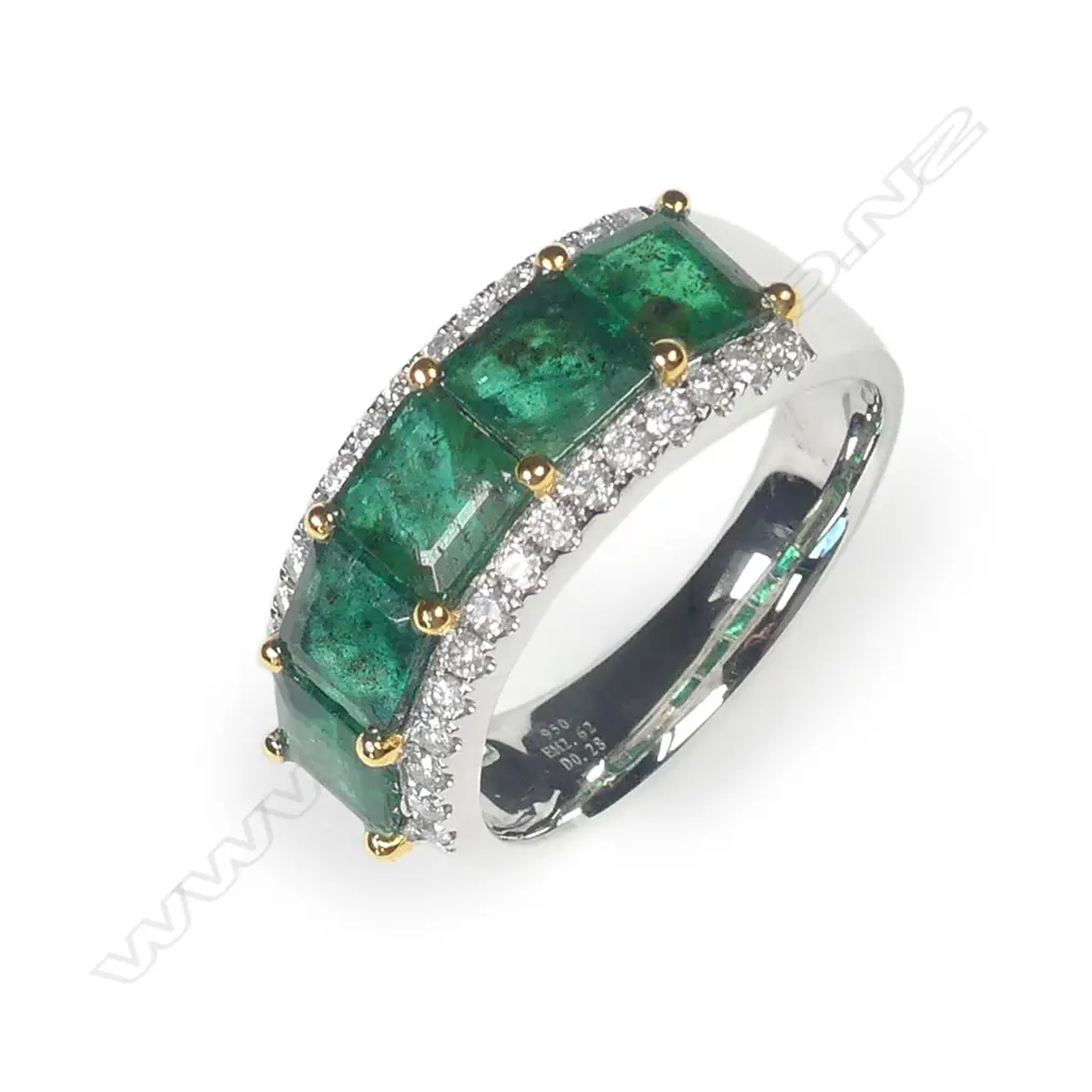 A platinum emerald and diamond ring Image 1++
