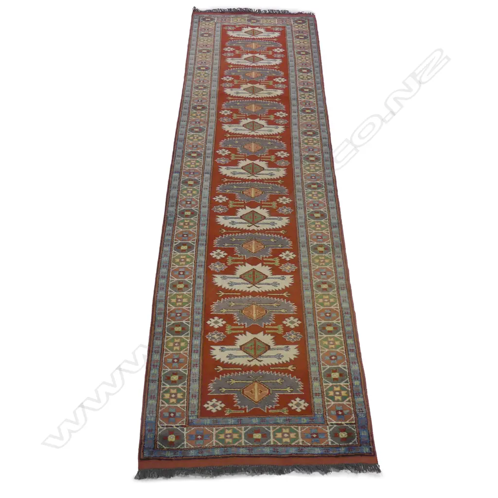 A hand-knotted runner Image 1++