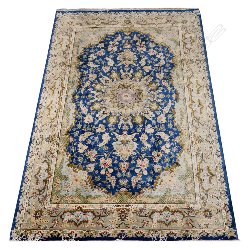 A silk hand-knotted rug Image 1++