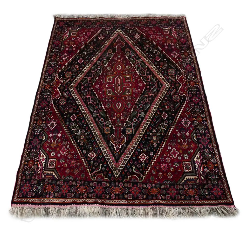 A large Persian rug Image 1++