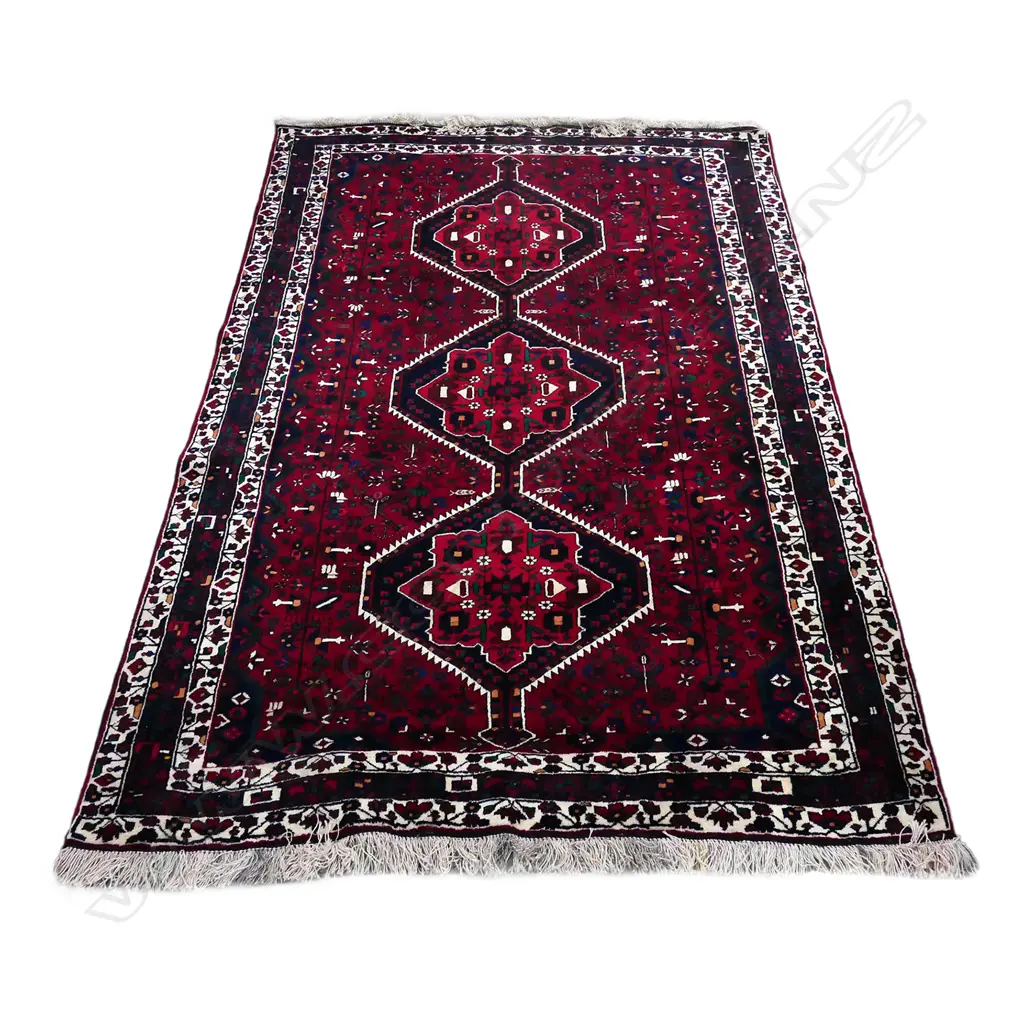 A large Persian rug Image 1++