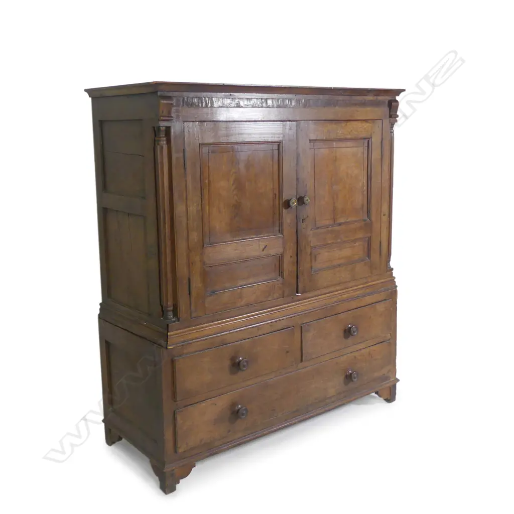 A Geo. III oak linen cupboard Image 1++