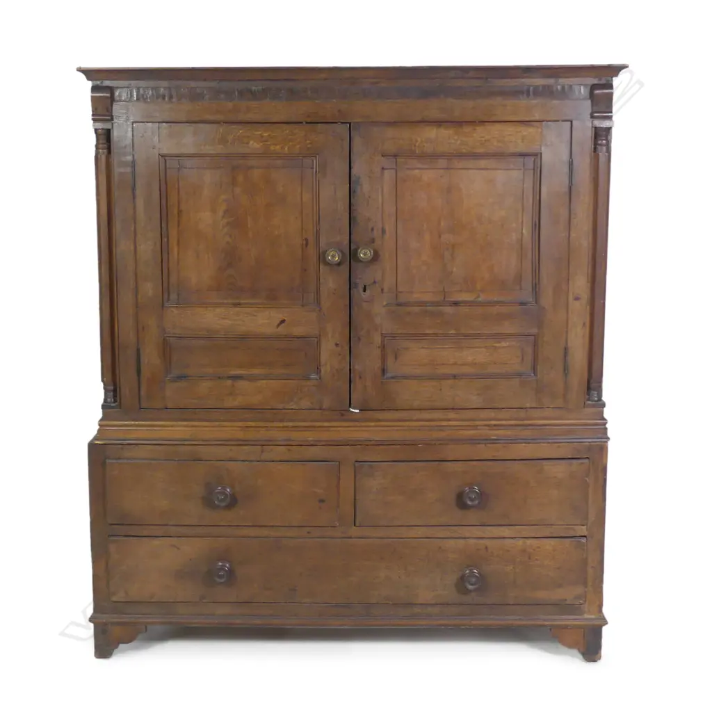 A Geo. III oak linen cupboard Image 1++