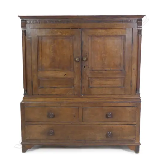 A Geo. III oak linen cupboard