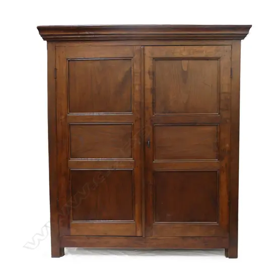 A Georgian fruitwood linen press/cupboard
