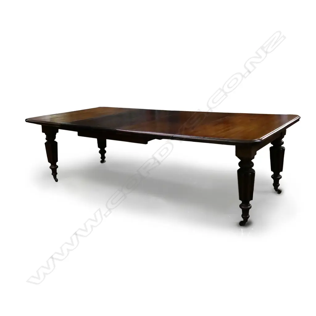 A Victorian mahogany extension dining table Image 1++