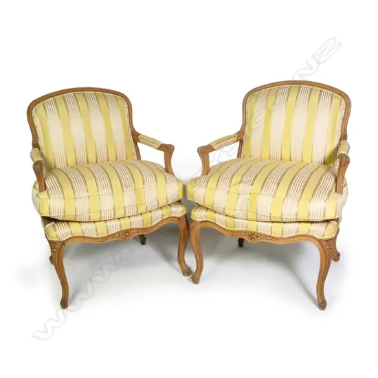 A pair of French style bergère chairs