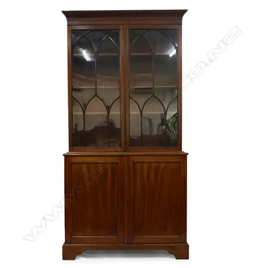 A Regency mahogany bookcase cabinet
