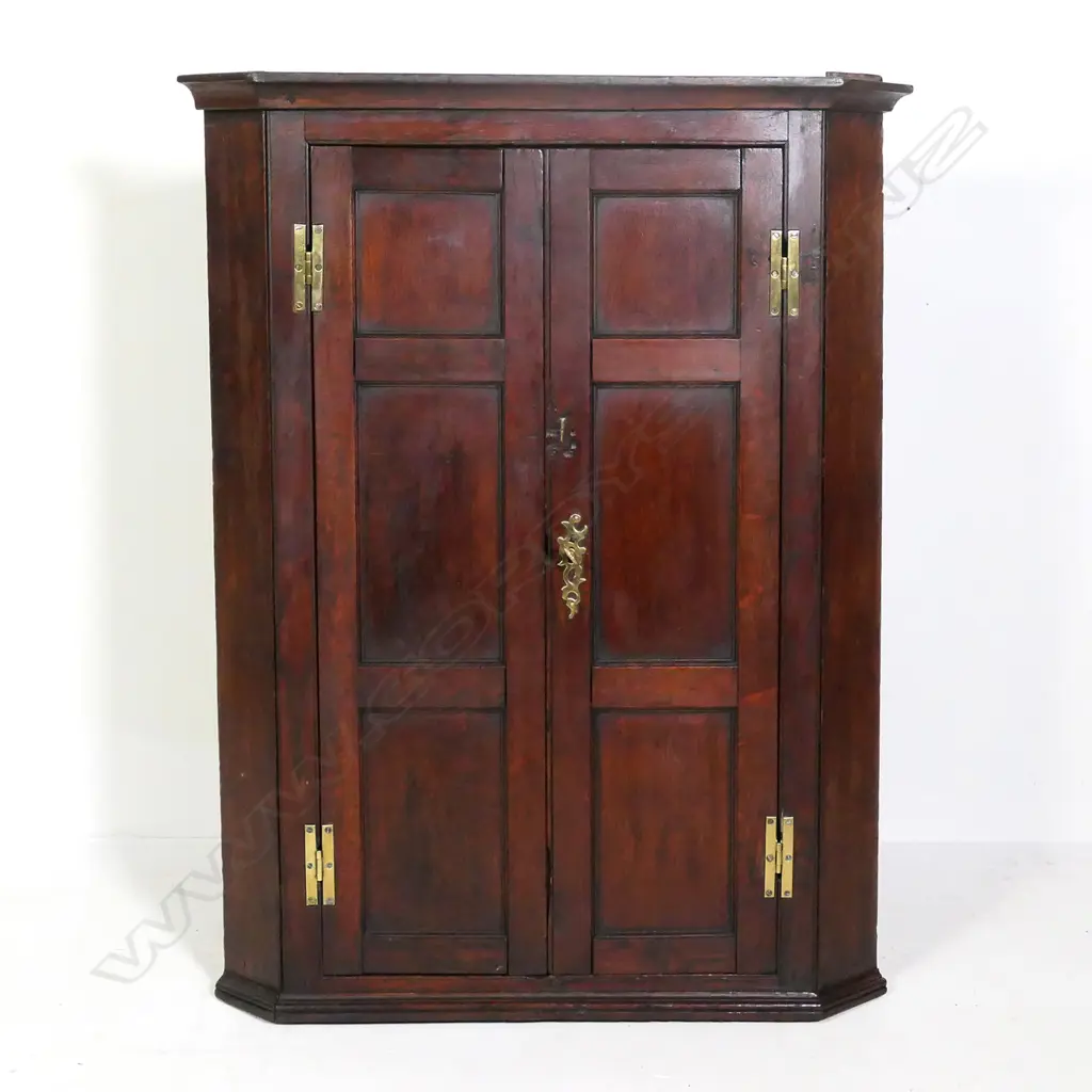 A Georgian oak corner cupboard Image 1++