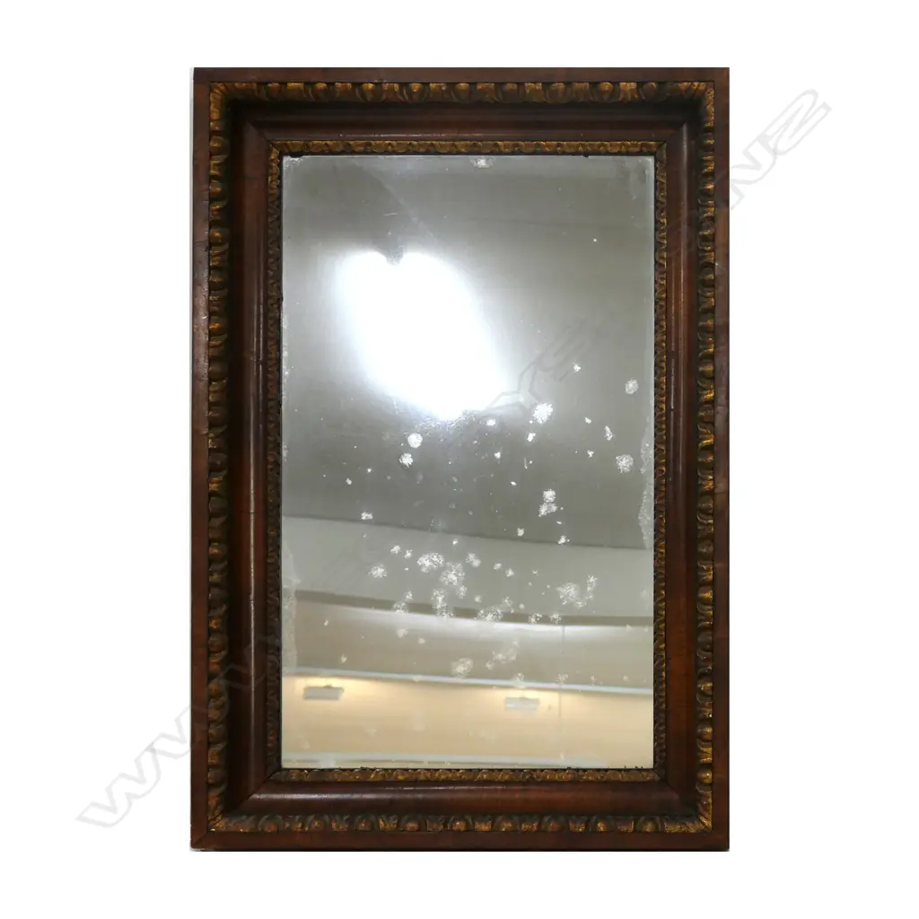 A Victorian walnut framed mirror Image 1++