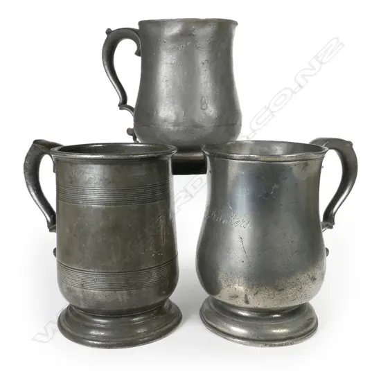 Three antique pewter mugs