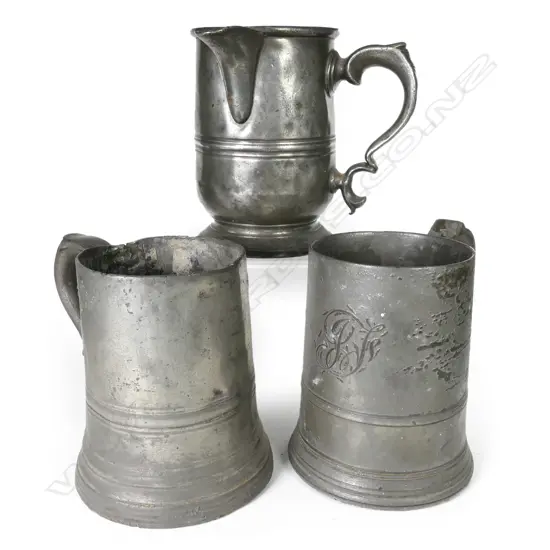 Three antique pewter mugs